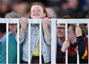 27 July 2015; A young race fan climbs for a better view of the action. Galway Racing Festival. Ballybrit, Galway. Picture credit: Cody Glenn / SPORTSFILE