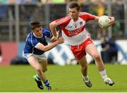 19 July 2015; Jack Doherty, Derry, in action against Darragh Kennedy, Cavan. Electric Ireland Ulster GAA Football Minor Championship Final, Cavan v Derry. St Tiernach's Park, Clones, Co. Monaghan. Picture credit: Oliver McVeigh / SPORTSFILE