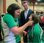 28 July 2015; Aquatics head coach Jenny Hughes, fixes the collar on the track suit of Team Ireland's Lorraine Hession before being introduced to the Lieutenant Governor of Calafornia, Gavin Newsom, after being presented with her 4th place ribbon for her swim in the AQ 100M Freestyle Division F14 event at the Uytengsu Aquatics Center. Lorraine is from a member of Team South Galway and from Turloughmore, Co. Galway, Special Olympics World Summer Games, Los Angeles, California, United States. Picture credit: Ray McManus / SPORTSFILE