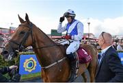 28 July 2015; Jockey Mark Enright celebrates in the parade ring after winning the Latin Quarter Beginners Steeplechase on Empresario. Galway Racing Festival, Ballybrit, Galway. Picture credit: Cody Glenn / SPORTSFILE