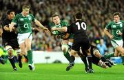 15 November 2008; Brian O'Driscoll, Ireland, is tackled by Dan Carter,10, and Richie McCaw, New Zealand. Guinness Autumn Internationals, Ireland v New Zealand, Croke Park, Dublin. Picture credit: Matt Browne / SPORTSFILE