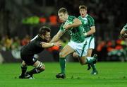 15 November 2008; Tomas O'Leary, Ireland, is tackled by Richie McCaw, New Zealand. Guinness Autumn Internationals, Ireland v New Zealand, Croke Park, Dublin. Picture credit: Matt Browne / SPORTSFILE