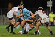 14 November 2008; David Gilchrist, UCD, is tackled by Richard Brady, left, Shane Young and Brian Coyle, 8, Trinity College. Annual Colours Rugby Match, UCD v Trinity College. Donnybrook Stadium, Dublin. Picture credit: Matt Browne / SPORTSFILE