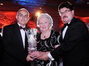 15 November 2008; Breda Synott, St. Benedict's AC, is presented with the Lifetime Achievement Award by John Foley, right, Chief Executive of Waterford Crystal and Liam Hennessy, President of Athletics Ireland. National Athletics Awards with Waterford Crystal, Crowne Plaza, Santry, Dublin. Photo by Sportsfile