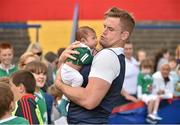 29 July 2015; Ireland's Jamie Heaslip with two month old Donncha Sands, from Midleton, Co. Cork, during squad training. Irish Independent Park, Cork. Picture credit: Matt Browne / SPORTSFILE