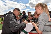 29 July 2015; Ireland head coach Joe Schmidt signs an autograph for Orla Walker, from Courtmacsherry, Co. Cork, after squad training. Irish Independent Park, Cork. Picture credit: Matt Browne / SPORTSFILE