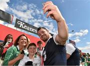 29 July 2015; Ireland's Cian Healy with Niamh and Eoin Dalton, from Carrigaline, Co. Cork, after squad training. Irish Independent Park, Cork. Picture credit: Matt Browne / SPORTSFILE