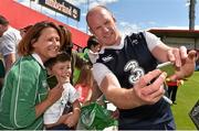 29 July 2015; Ireland's Paul O'Connell with Niamh and Eoin Dalton, from Carrigaline, Co. Cork, after squad training. Irish Independent Park, Cork. Picture credit: Matt Browne / SPORTSFILE