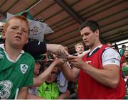 29 July 2015; Ireland's Jonathan Sexton signs autograph for supporters after squad training. Irish Independent Park, Cork. Picture credit: Matt Browne / SPORTSFILE