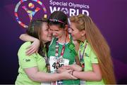 29 July 2015; Team Ireland’s Aoife Beston, a member of Claremorris All Stars Special Olympics Club, from Claremorris, Co. Mayo, celebrates with her sisters Lorraine, left, and Laura after competing in the 5,000M event at the at the Katherine B. Loker Stadium. Special Olympics World Summer Games, Los Angeles, California, United States. Picture credit: Ray McManus / SPORTSFILE