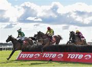 29 July 2015; Shanahan's Turn, centre, with Jonathan Burke up, trails Baily Green, left, with Mark Enright up, who finished sixteenth, on their way to winning the thetote.com Galway Plate. Galway Racing Festival, Ballybrit, Galway. Picture credit: Cody Glenn / SPORTSFILE