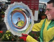 29 July 2015; Jockey Jonathan Buckley celebrates with the Galway Plate after riding Shanahan's Turn to win the the thetote.com Galway Plate. Galway Racing Festival, Ballybrit, Galway. Picture credit: Dáire Brennan / SPORTSFILE