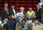29 July 2015; The President of Ireland Michael D. Higgins presents the Galway Plate to trainer Henry de Bromhead and jockey Jonathan Burke after thetote.com Galway Plate. Galway Racing Festival, Ballybrit, Galway. Picture credit: Dáire Brennan / SPORTSFILE