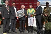29 July 2015; The President of Ireland Michael D. Higgins presents the Galway Plate to trainer Henry de Bromhead and jockey Jonathan Burke after thetote.com Galway Plate. Galway Racing Festival, Ballybrit, Galway. Picture credit: Cody Glenn / SPORTSFILE