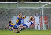 29 July 2015; Abbey Dunphy, Waterford, is closed down by Roscommon's Roisin Wynne as she takes a shot on goal. All Ireland U16 B Ladies Football Championship Final, Roscommon v Waterford, McDonagh Park, Nenagh, Co. Tipperary. Picture credit: Seb Daly / SPORTSFILE