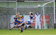 29 July 2015; Abbey Dunphy, Waterford, is closed down by Roscommon's Roisin Wynne as she takes a shot on goal. All Ireland U16 B Ladies Football Championship Final, Roscommon v Waterford, McDonagh Park, Nenagh, Co. Tipperary. Picture credit: Seb Daly / SPORTSFILE