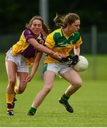 29 July 2015; Niamh McGovern, Leitrim, in action against Emma Cousins, Wexford. All Ireland U16 C Ladies Football Championship Final, Leitrim v Wexford, Clane, Co. Kildare. Picture credit: Piaras Ó Mídheach / SPORTSFILE