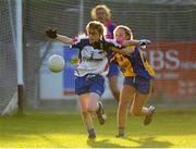 29 July 2015; Waterford's Becky Hogan in action against Roscommon's Aoibheann Reilly. All Ireland U16 B Ladies Football Championship Final, Roscommon v Waterford, McDonagh Park, Nenagh, Co. Tipperary. Picture credit: Seb Daly / SPORTSFILE