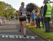 29 July 2015; Karina Murphy, from Coachford, Co. Cork, who was the first lady to finish in the Novartis 5K. Novartis facility, Ringaskiddy, Cork. Picture credit: Matt Browne / SPORTSFILE