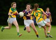 29 July 2015; Rachel Bennett, Wexford, in action against Niamh McNiffe, left, and Mary Broughton, Leitrim. All Ireland U16 C Ladies Football Championship Final, Leitrim v Wexford, Clane, Co. Kildare. Picture credit: Piaras Ó Mídheach / SPORTSFILE