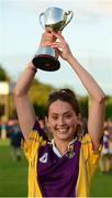 29 July 2015; Wexford captain Emma Cousins celebrates with the cup after the game. All Ireland U16 C Ladies Football Championship Final, Leitrim v Wexford, Clane, Co. Kildare. Picture credit: Piaras Ó Mídheach / SPORTSFILE