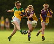 29 July 2015; Caoimhe Gaffney, Leitrim, in action against Gillian Barry, Wexford. All Ireland U16 C Ladies Football Championship Final, Leitrim v Wexford, Clane, Co. Kildare. Picture credit: Piaras Ó Mídheach / SPORTSFILE
