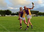 29 July 2015; Wexford's Becky Hamilton, left, and captain Emma Cousins celebrate after the game. All Ireland U16 C Ladies Football Championship Final, Leitrim v Wexford, Clane, Co. Kildare. Picture credit: Piaras Ó Mídheach / SPORTSFILE