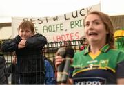 29 July 2015; A young Kerry supporter looks on as Kerry captain Faye O'Donoghue makes her acceptance speech after victory over Galway. All Ireland U16 A Ladies Football Championship Final, Galway v Kerry, Bruff, Co. Limerick. Picture credit: Diarmuid Greene / SPORTSFILE