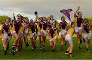 29 July 2015; Wexford captain Emma Cousins, centre, and her team-mates celebrate after the game. All Ireland U16 C Ladies Football Championship Final, Leitrim v Wexford, Clane, Co. Kildare. Picture credit: Piaras Ó Mídheach / SPORTSFILE