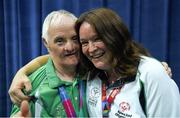 30 July 2015; Team Ireland’s Peter Malynn, a member of St Hilda’s Work Therapy Unit, from Mullingar, Co. Westmeath, with Special Olympics Ireland Bocce head coach Jackie Moran after he was presented with his Gold Medal at the Los Angeles Convention Center. Special Olympics World Summer Games, Los Angeles, California, United States. Picture credit: Ray McManus / SPORTSFILE