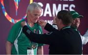 30 July 2015; Team Ireland’s Peter Malynn, a member of St Hilda’s Work Therapy Unit, from Mullingar, Co. Westmeath, is presented with his Gold Medal, for Bocce, at the Los Angeles Convention Center. Special Olympics World Summer Games, Los Angeles, California, United States. Picture credit: Ray McManus / SPORTSFILE