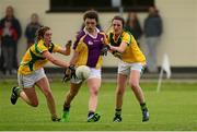 29 July 2015; Teghan Furlong, Wexford, in action against Eimear Gibbons, left, and Caoimhe  Reynolds, Leitrim. All Ireland U16 C Ladies Football Championship Final, Leitrim v Wexford, Clane, Co. Kildare. Picture credit: Piaras Ó Mídheach / SPORTSFILE