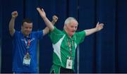 30 July 2015; Team Ireland’s Peter Malynn, a member of St Hilda’s Work Therapy Unit, from Mullingar, Co. Westmeath, leads Silver medal winner Georgios Psarakis, from SO Hellas, Greece, as he arrives to collect his Gold Medal, for Bocce, at the Los Angeles Convention Center. Special Olympics World Summer Games, Los Angeles, California, United States. Picture credit: Ray McManus / SPORTSFILE
