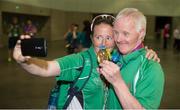 30 July 2015; Elizebeth Lynch, assistant head of delegation, SOI, takes a picture of herself and  Team Ireland’s Peter Malynn, a member of St Hilda’s Work Therapy Unit, from Mullingar, Co. Westmeath, after he was presented with his Gold Medal, for Bocce, at the Los Angeles Convention Center. Special Olympics World Summer Games, Los Angeles, California, United States. Picture credit: Ray McManus / SPORTSFILE
