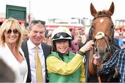 30 July 2015; Jockey Denis O'Regan with owners John and Debbie Breslin after riding Quick Jack to victory in the Guinness Galway Hurdle Handicap. Galway Racing Festival, Ballybrit, Galway. Picture credit: Cody Glenn / SPORTSFILE