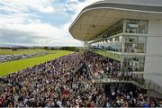 30 July 2015; General view of the crowds in the grandstands. Galway Racing Festival, Ballybrit, Galway. Picture credit: Cody Glenn / SPORTSFILE