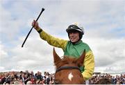 30 July 2015; Denis O'Regan celebrates after winning the Guinness Galway Hurdle Handicap on Quick Jack. Galway Racing Festival, Ballybrit, Galway. Picture credit: Cody Glenn / SPORTSFILE