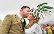 30 July 2015; Laura Kilcoyne, from Tipperary, gets a kiss on the cheek from Tommy Ruane of Bennettsbridge, Kilkenny. Galway Racing Festival, Ballybrit, Galway. Picture credit: Cody Glenn / SPORTSFILE
