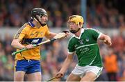 30 July 2015; David Fitzgerald, Clare, in action against Tom Morrissey, Limerick. Bord Gáis Energy Munster GAA Hurling U21 Championship Final, Clare v Limerick. Cusack Park, Ennis, Co. Clare. Picture credit: Stephen McCarthy / SPORTSFILE