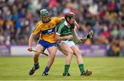 30 July 2015; David Dempsey, Limerick, in action against David Conroy, Clare. Bord Gáis Energy Munster GAA Hurling U21 Championship Final, Clare v Limerick. Cusack Park, Ennis, Co. Clare. Picture credit: Stephen McCarthy / SPORTSFILE