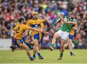 30 July 2015; Darragh O'Donovan, Limerick, in action against Eoin Quirke, Clare. Bord Gáis Energy Munster GAA Hurling U21 Championship Final, Clare v Limerick. Cusack Park, Ennis, Co. Clare. Picture credit: Stephen McCarthy / SPORTSFILE