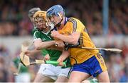 30 July 2015; Bobby Duggan, Clare, in action against Richie English, Limerick. Bord Gáis Energy Munster GAA Hurling U21 Championship Final, Clare v Limerick. Cusack Park, Ennis, Co. Clare. Picture credit: Stephen McCarthy / SPORTSFILE