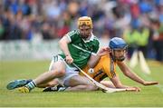 30 July 2015; Richie English, Limerick, in action against Shane O'Donnell, Clare. Bord Gáis Energy Munster GAA Hurling U21 Championship Final, Clare v Limerick. Cusack Park, Ennis, Co. Clare. Picture credit: Stephen McCarthy / SPORTSFILE
