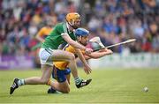 30 July 2015; Richie English, Limerick, in action against Shane O'Donnell, Clare. Bord Gáis Energy Munster GAA Hurling U21 Championship Final, Clare v Limerick. Cusack Park, Ennis, Co. Clare. Picture credit: Stephen McCarthy / SPORTSFILE