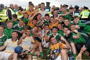 30 July 2015; Limerick players celebrate with the Corn na Cásca following their victory. Bord Gáis Energy Munster GAA Hurling U21 Championship Final, Clare v Limerick. Cusack Park, Ennis, Co. Clare. Picture credit: Stephen McCarthy / SPORTSFILE