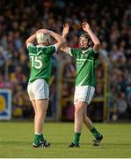 30 July 2015; Limerick's Cian Lynch, left, and David Dempsey celebrate at the final whistle after victory over Clare. Bord Gáis Energy Munster GAA Hurling U21 Championship Final, Clare v Limerick, Cusack Park, Ennis, Co. Clare. Picture credit: Diarmuid Greene / SPORTSFILE