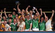 30 July 2015; Limerick captain Diarmaid Byrnes lifts the Corn na Cásca surrounded by team-mates following their victory. Bord Gáis Energy Munster GAA Hurling U21 Championship Final, Clare v Limerick. Cusack Park, Ennis, Co. Clare. Picture credit: Stephen McCarthy / SPORTSFILE