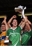 30 July 2015; Limerick captain Diarmaid Byrnes lifts the Corn na Cásca following his side's victory. Bord Gáis Energy Munster GAA Hurling U21 Championship Final, Clare v Limerick. Cusack Park, Ennis, Co. Clare. Picture credit: Stephen McCarthy / SPORTSFILE