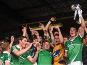 30 July 2015; Limerick captain Diarmaid Byrnes lifts the Corn na Cásca surrounded by team-mates following their victory. Bord Gáis Energy Munster GAA Hurling U21 Championship Final, Clare v Limerick. Cusack Park, Ennis, Co. Clare. Picture credit: Stephen McCarthy / SPORTSFILE