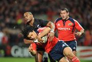 18 November 2008; Doug Howlett, Munster, is tackled by Joe Rokokoko, New Zealand. Zurich Challenge Match, Munster v New Zealand, Thomond Park, Limerick. Picture credit: Matt Browne / SPORTSFILE